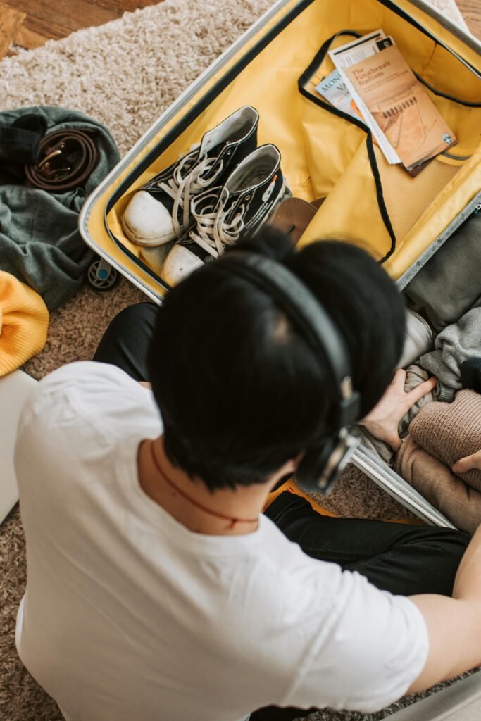 person packing for trip