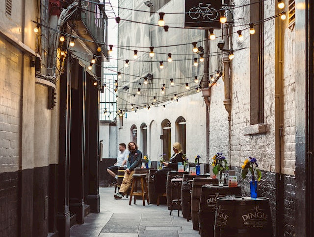 a standing pub in a narrow alley