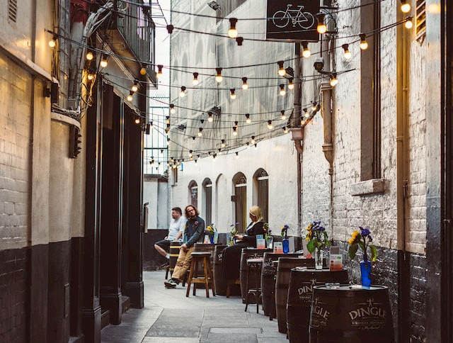 a standing pub in a narrow alley