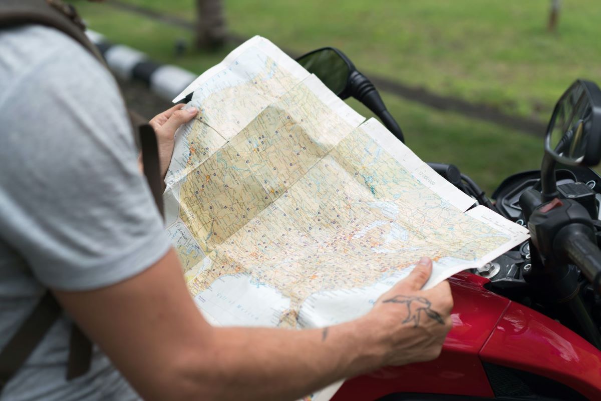 man looking at map