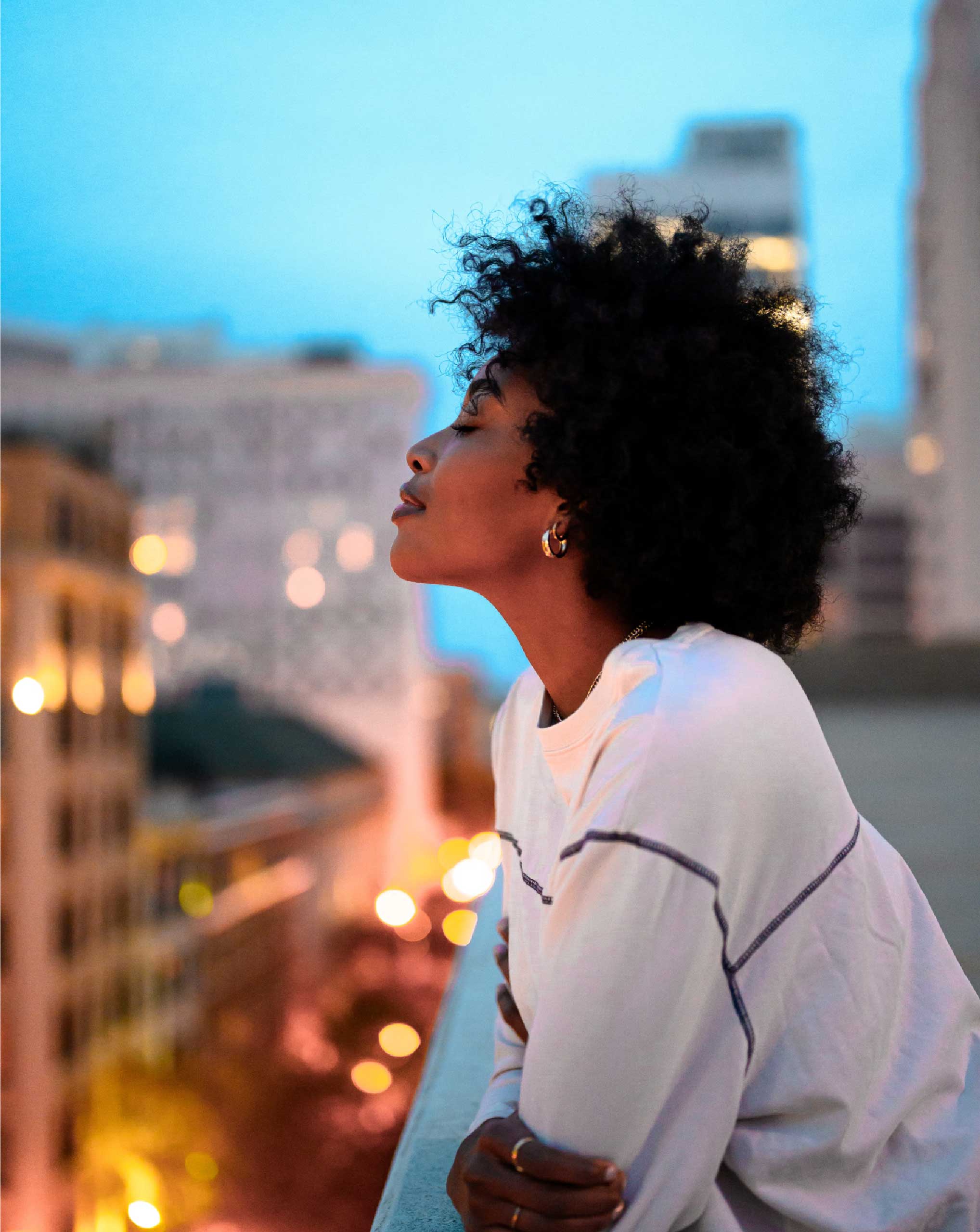 a woman on a balcony