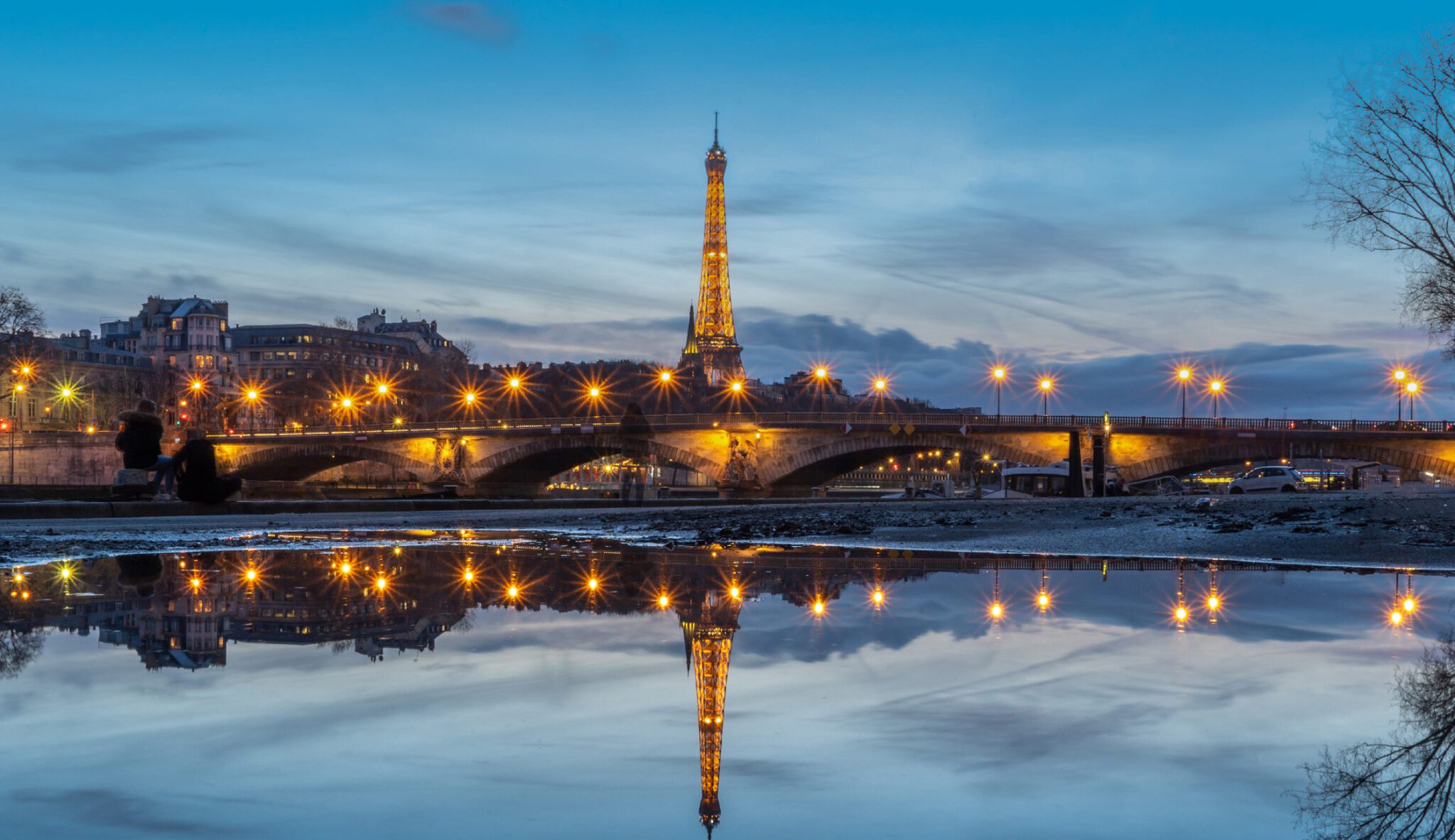 Eiffel Tower reflecting in a river