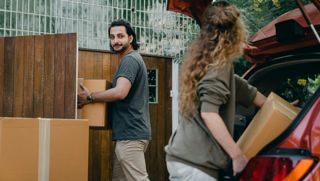 A couple moving into their new home