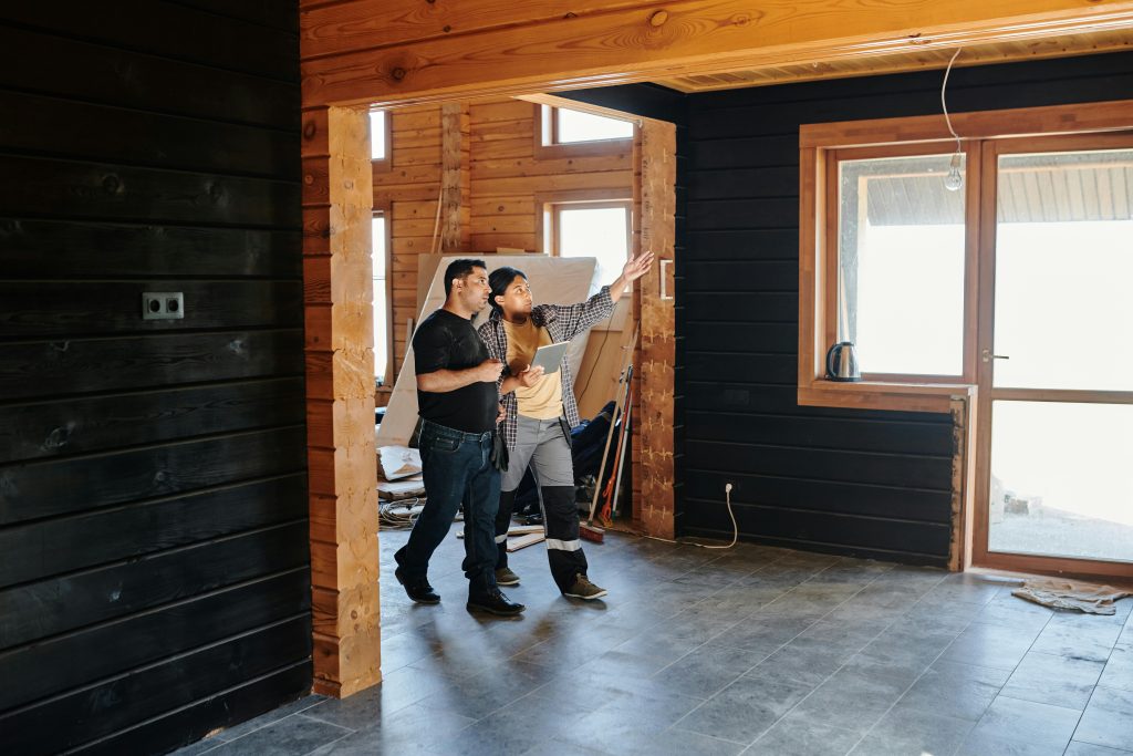 Two People Checking on a Construction Project.