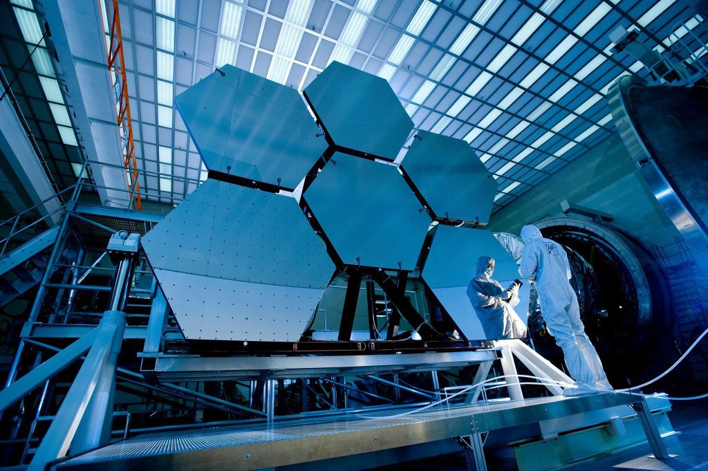 Aerospace professional working on aircraft.