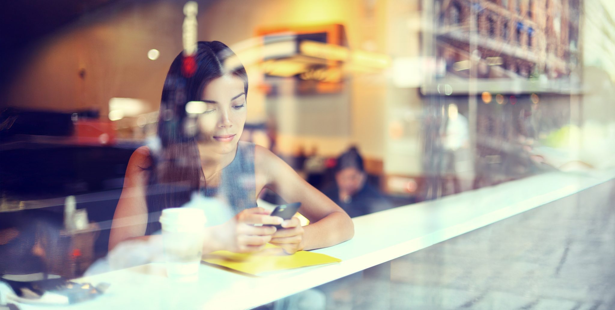 Woman working in a cafe.