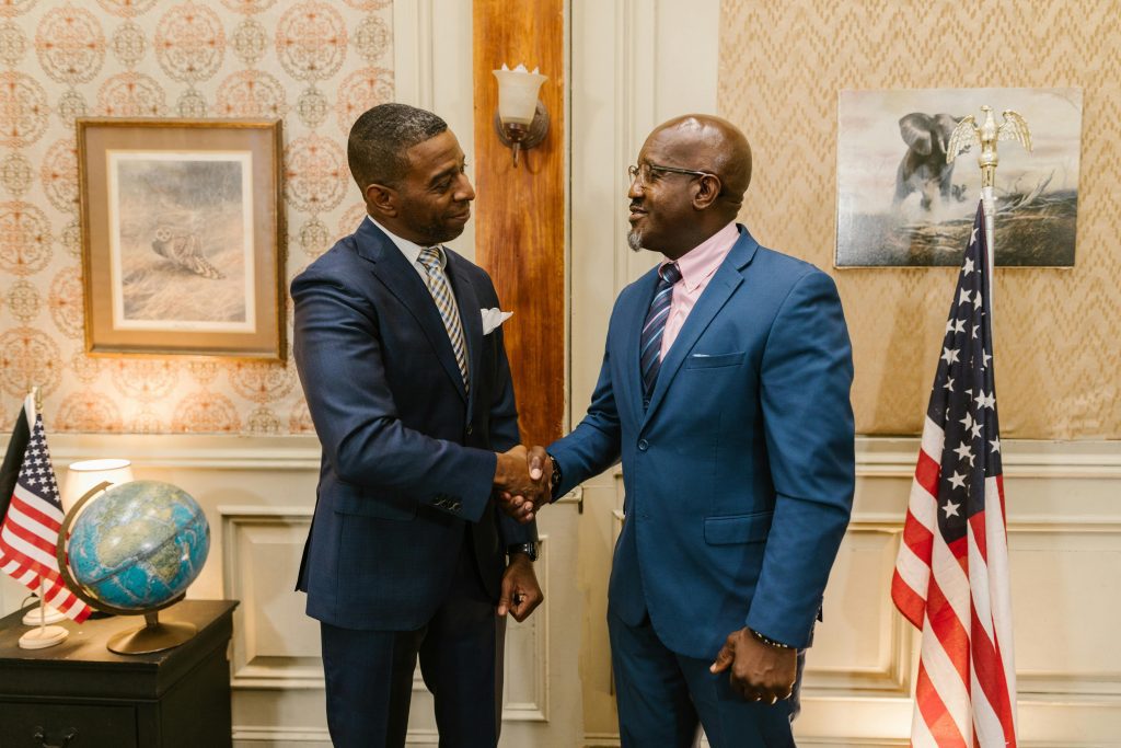 Two people shaking hands.
