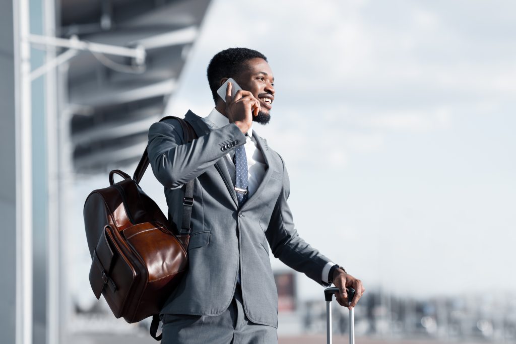 man leaving airport