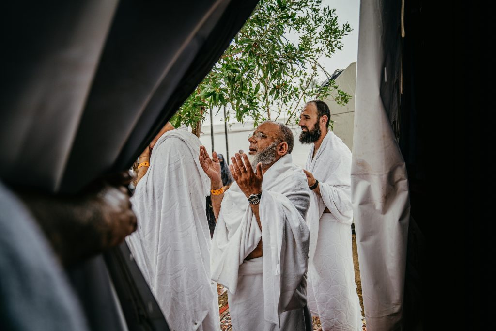 Men in prayer at the Mecca.