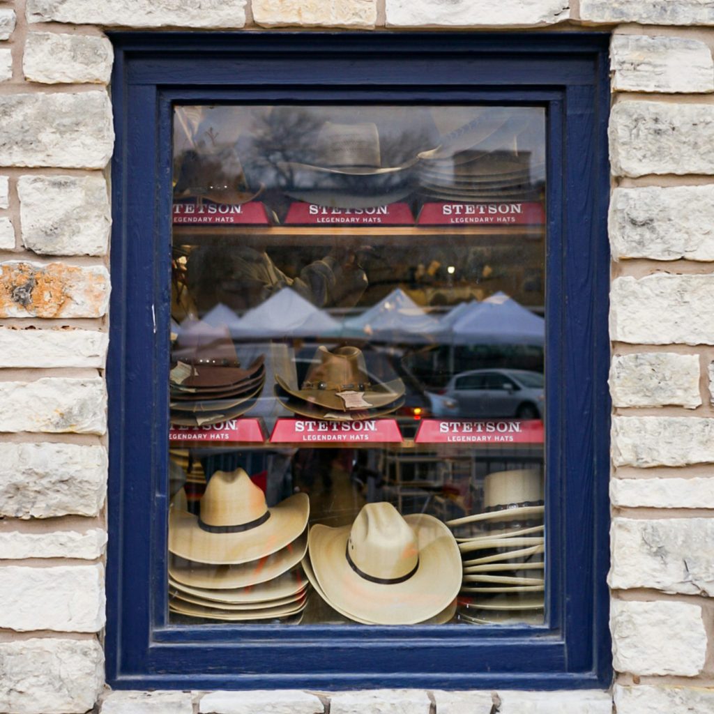 Cowboy hats in window